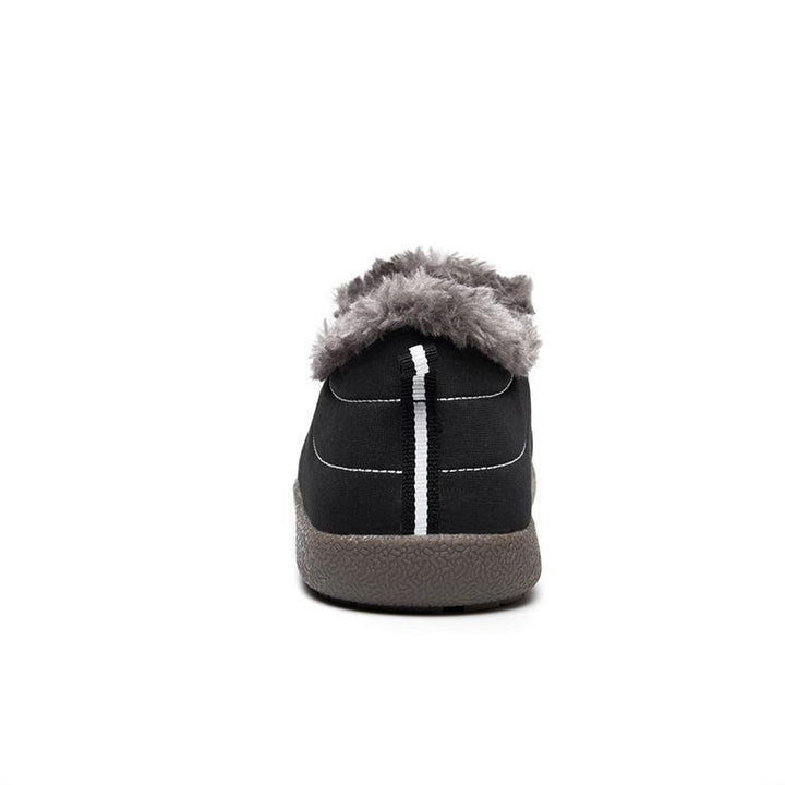Outdoor shot of men's warm cotton boots, designed for comfort in snow