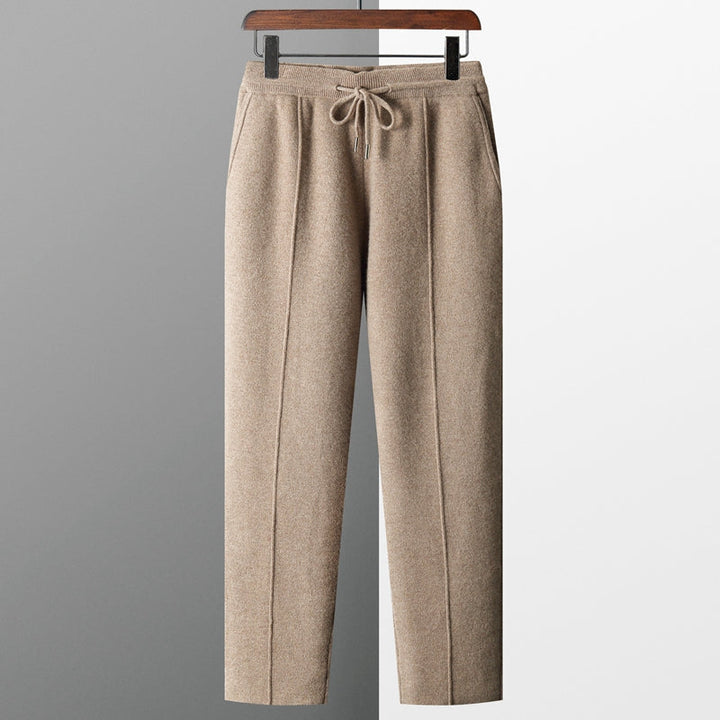 Merino blend lounge pants for men, in a neutral color, styled casually for home or everyday.