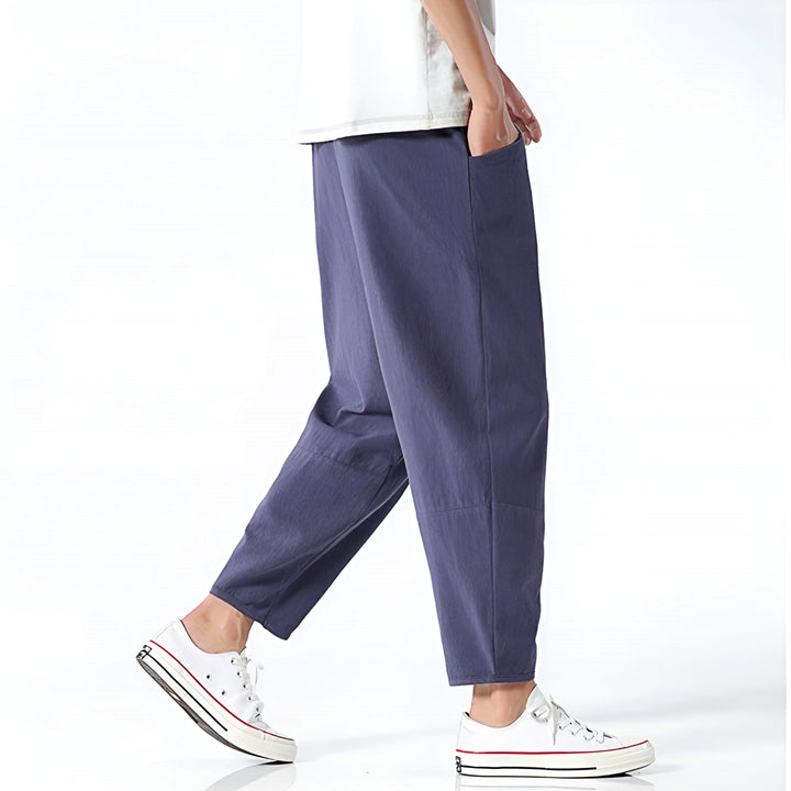Indigo men's cropped drawstring pants, versatile for summer fashion & leisure.