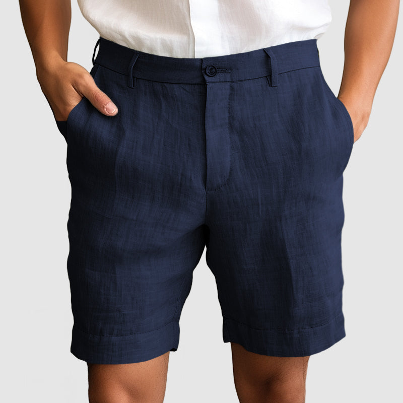 Cuffed flat front men's dress shorts, ideal for smart casual summer outfits. Tailored and comfortable.