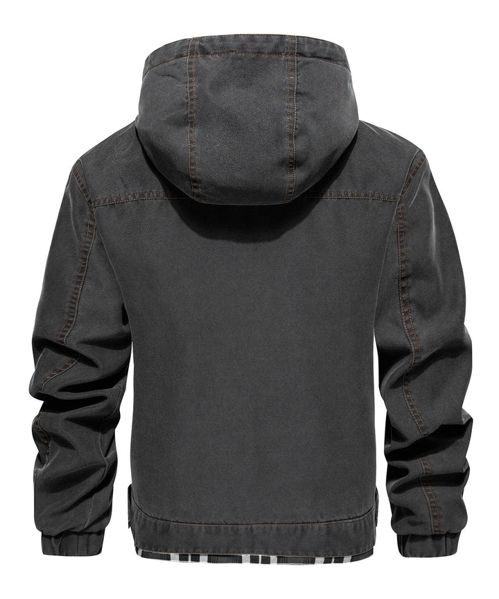 Close-up of distressed detailing on the men's canvas jacket, showcasing rugged texture