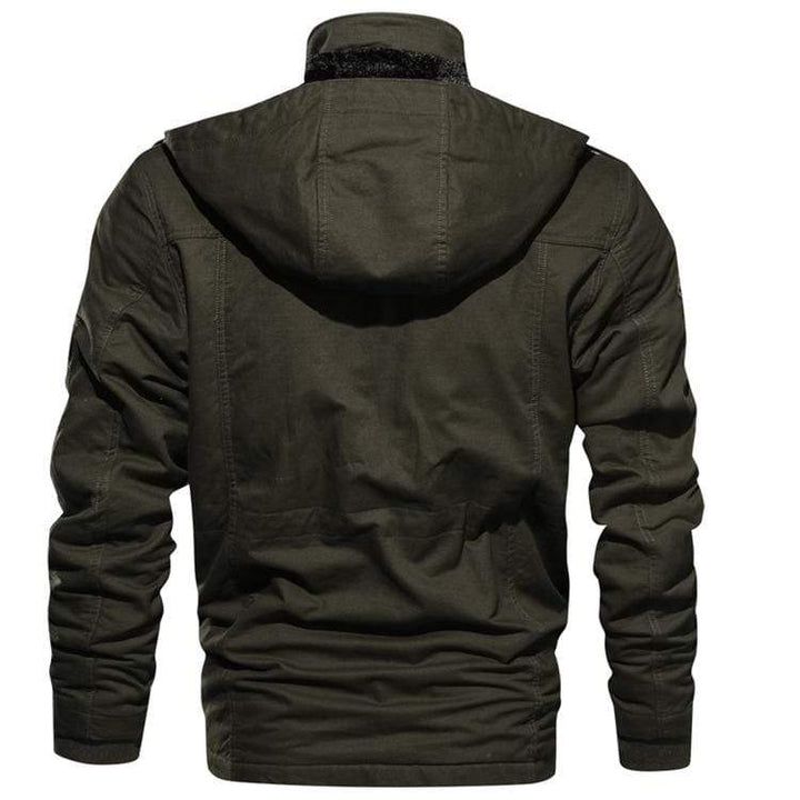 Man posing confidently in a rugged pilot bomber jacket, perfect for outdoor activities