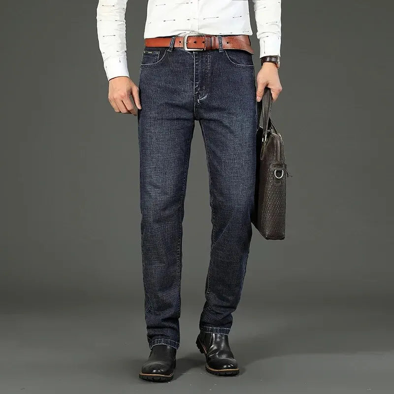 Close-up of men's stretch denim jeans fabric, showcasing durability and comfortable fit for daily wear.
