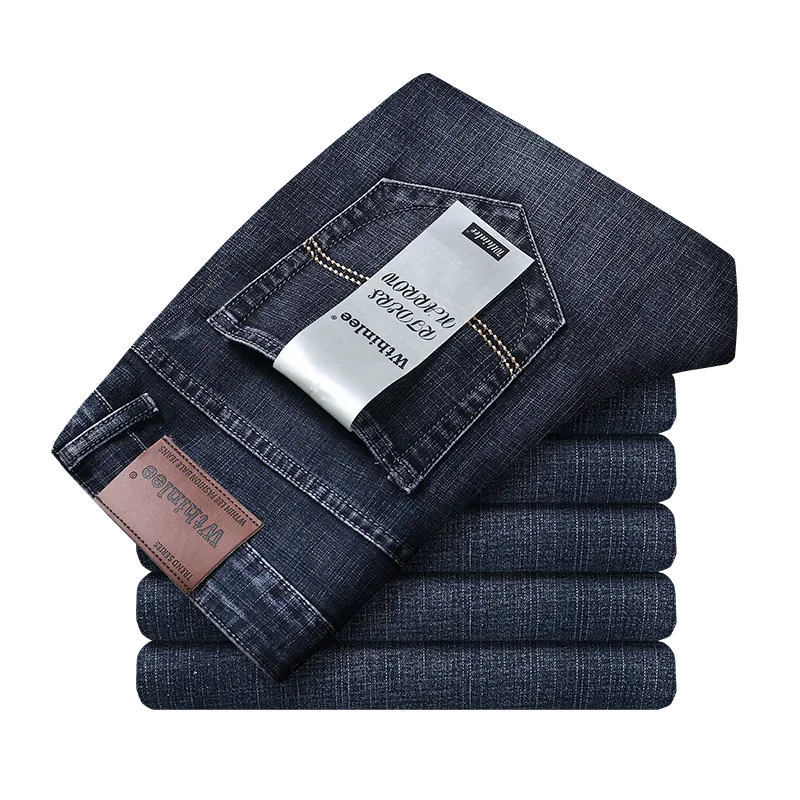 Stylish men's durable jeans in a classic denim wash, offering stretch and a straight leg design.