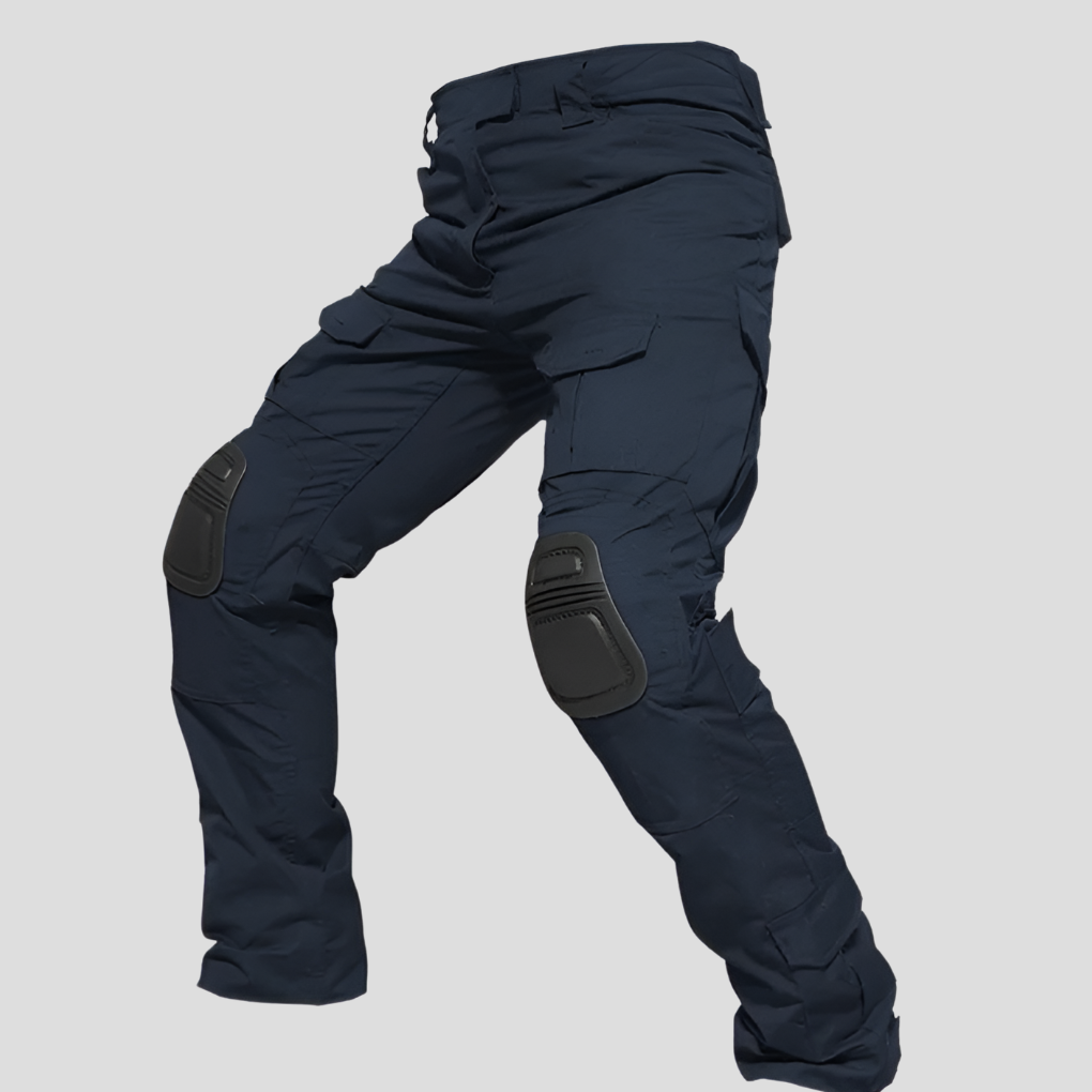 Man wearing tactical cargo pants with knee pads, ready for adventure. Durable outdoor gear for all terrains.