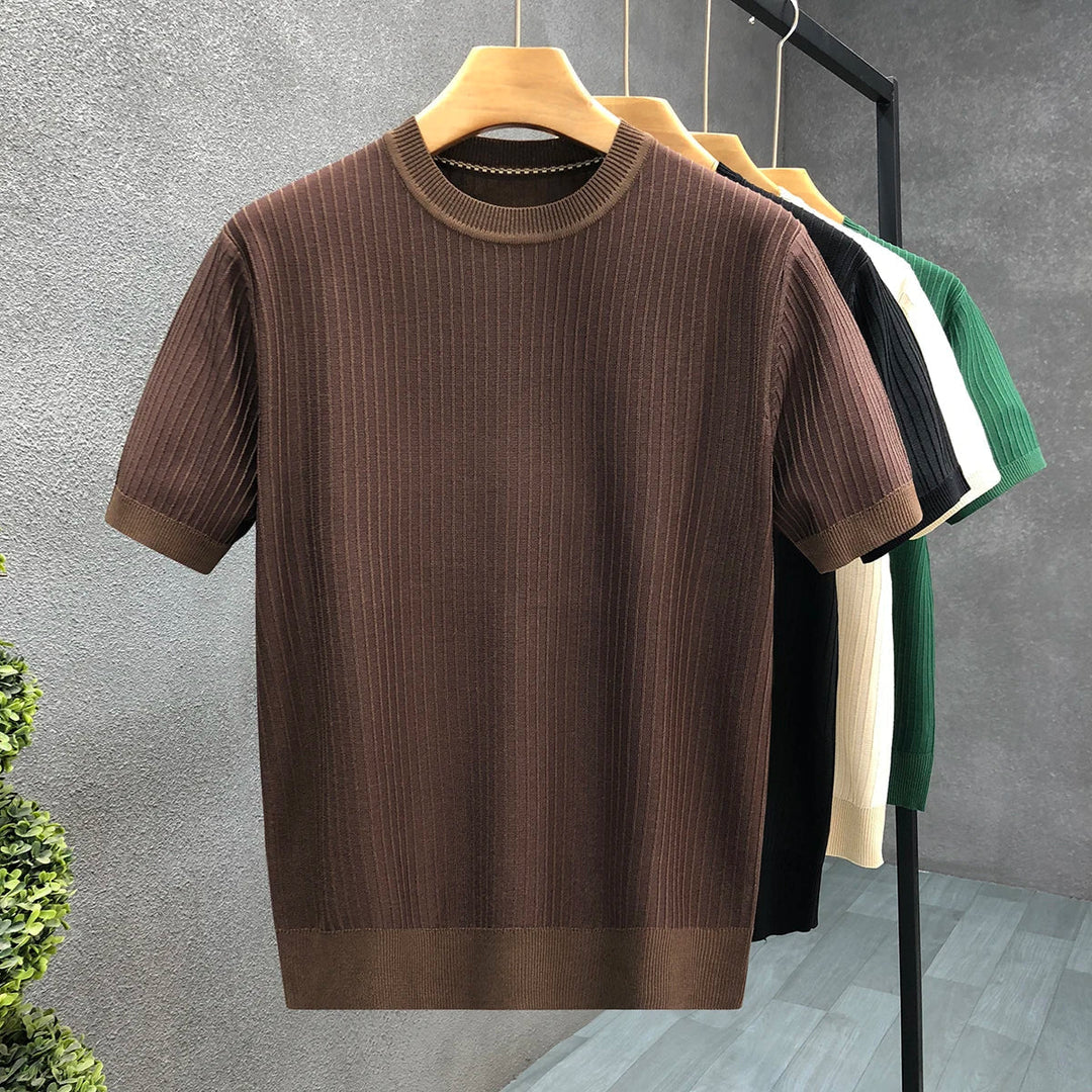 Versatile men's everyday crewneck top. Comfortable long sleeve shirt features a stylish modern fit and ribbed texture.
