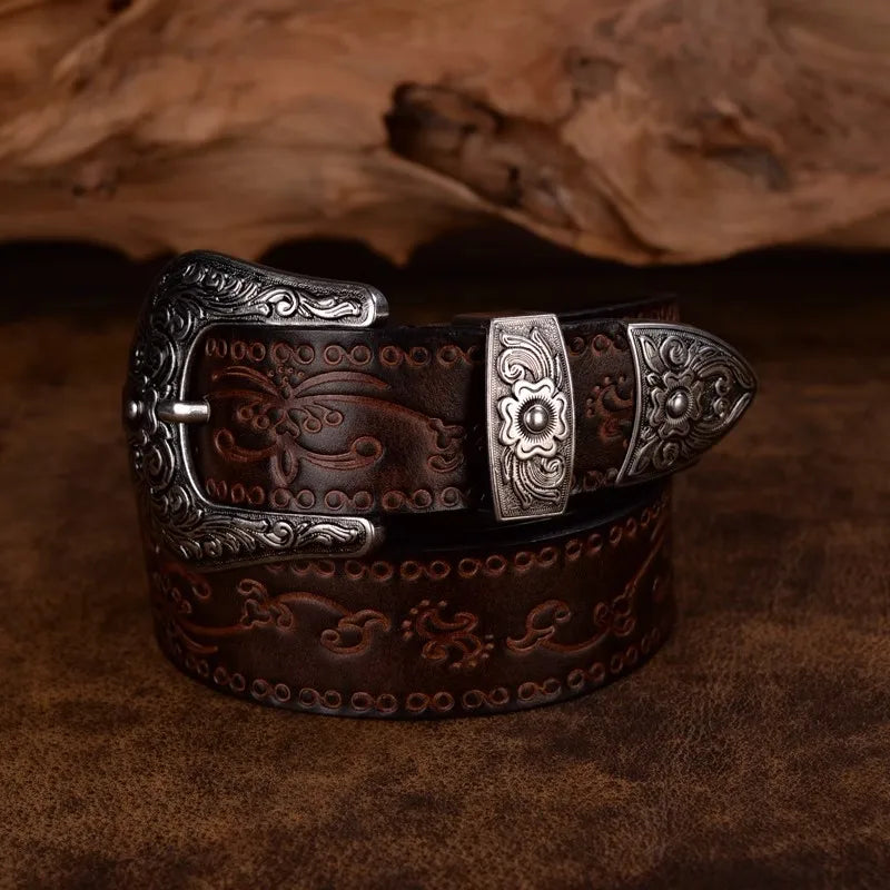 Stylish men's western belt, dark leather with detailed engraving. Features a robust metal buckle. Classic rustic look.