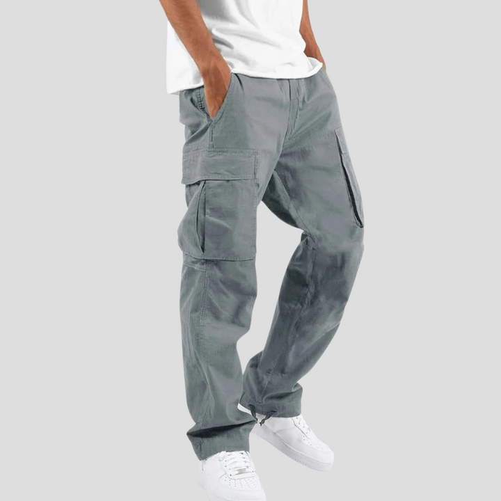 Comfortable & durable men's cargo pants, ideal for daily wear, featuring a relaxed fit & practical utility pockets.