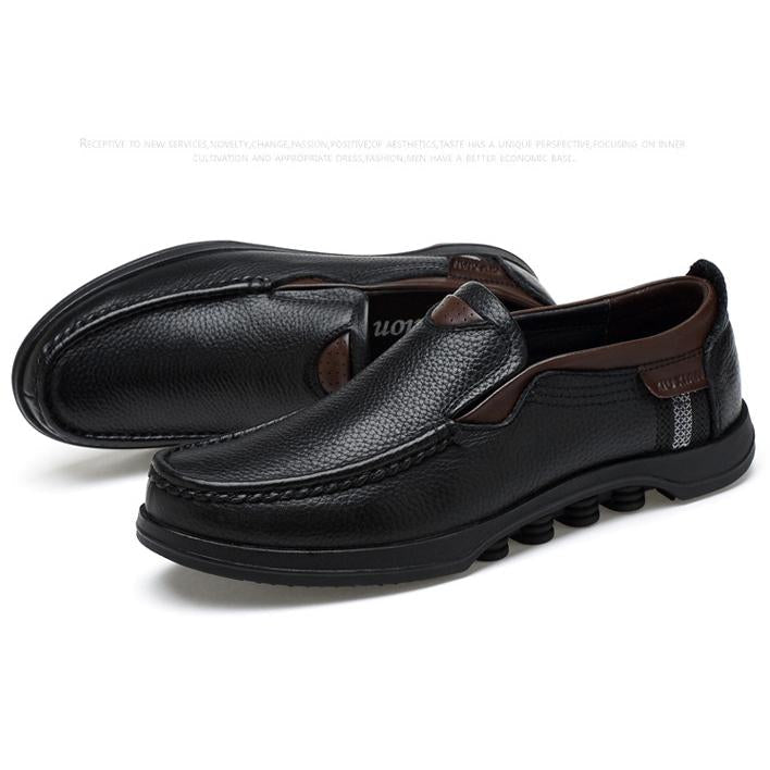 Front view of men's faux leather casual loafers, showcasing toe design.