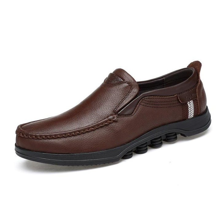 Relaxed fit men's faux leather loafers, ultimate slip-on comfort.
