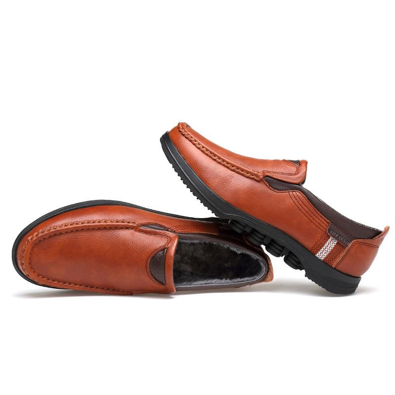 Pair of men's faux leather slip-on loafers, ready for a casual look.