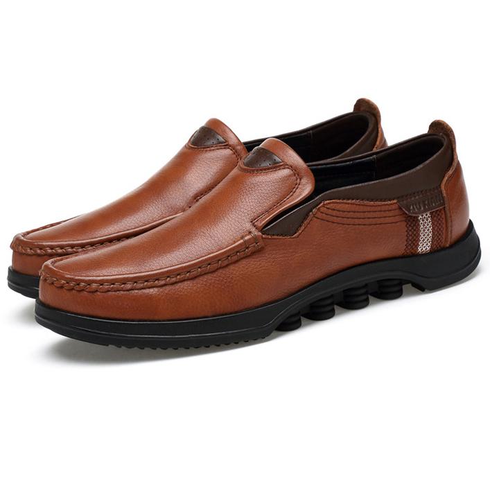Detail of the stitching on men's faux leather casual slip-on loafers.