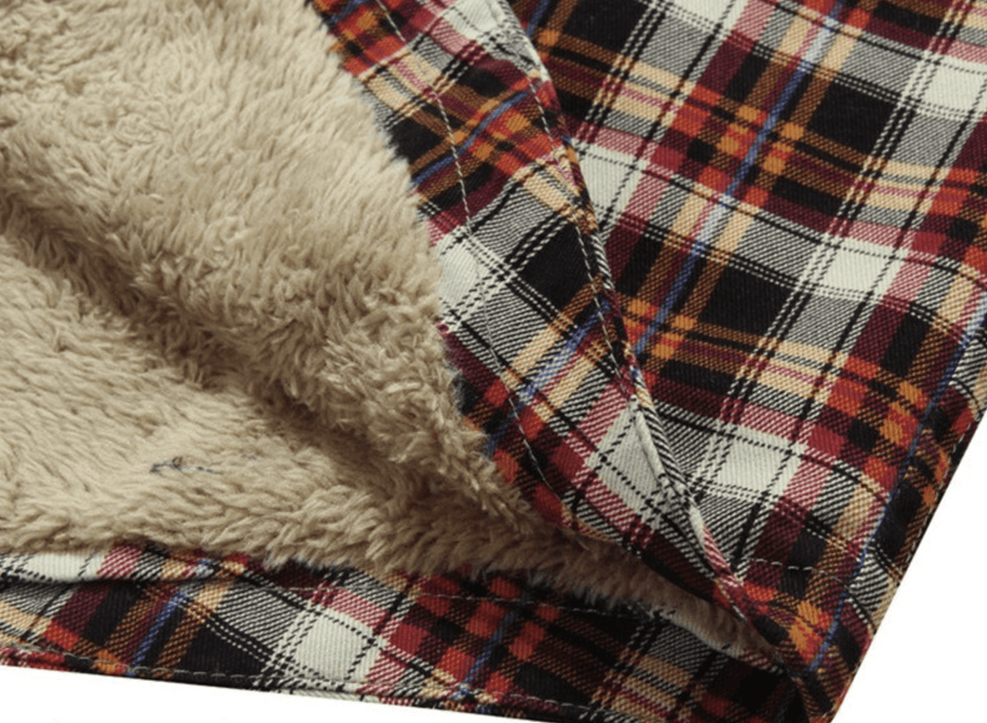 Stylish men's red wine flannel lined jacket, paired with jeans, demonstrating a complete casual winter outfit