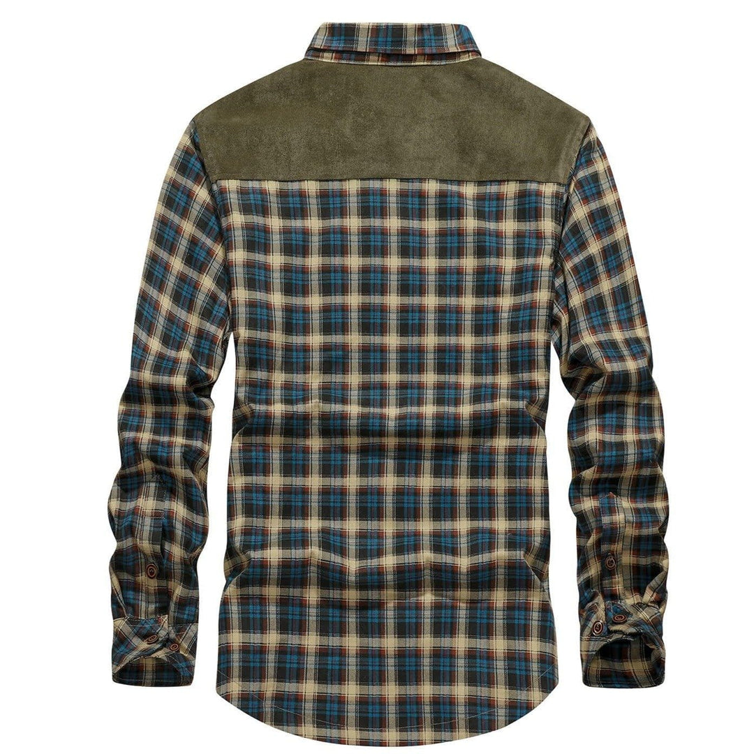 Close-up of the durable snap buttons on a men's blue flannel lined jacket, highlighting quality stitching