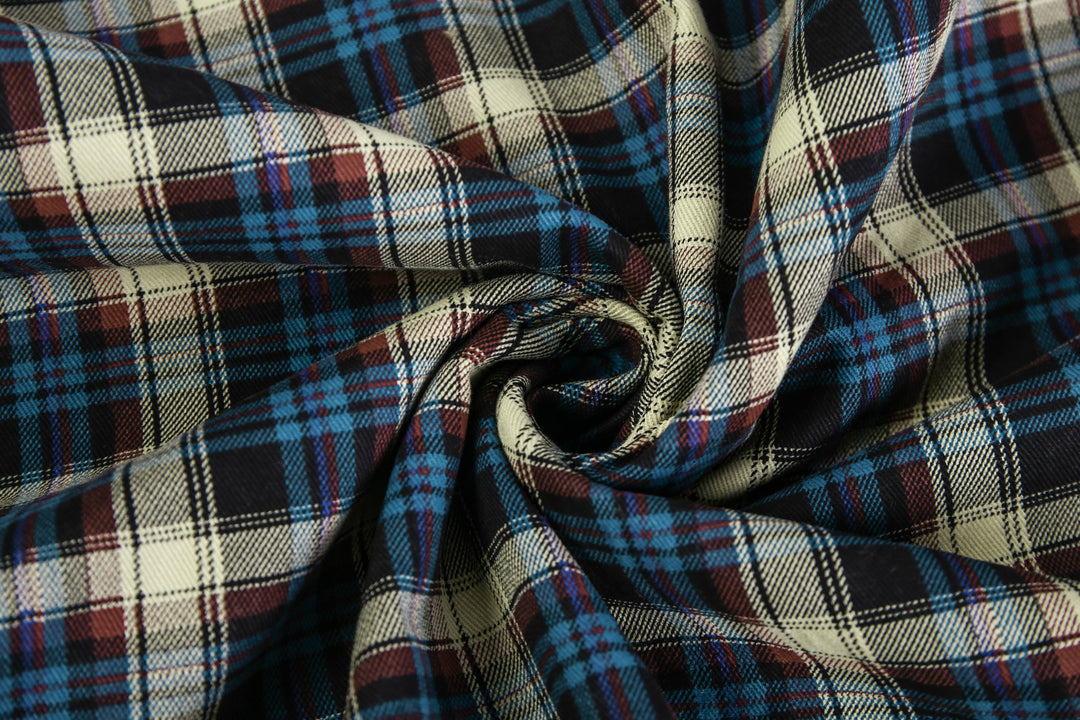 Detailed image of the flannel lining inside a men's blue winter coat, emphasizing its warmth and comfort