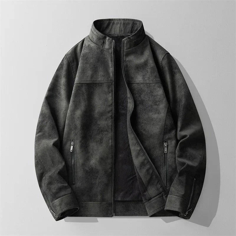 Close-up of a men's suede-like jacket with soft fleece lining, perfect for cold weather. Features zippered pockets.