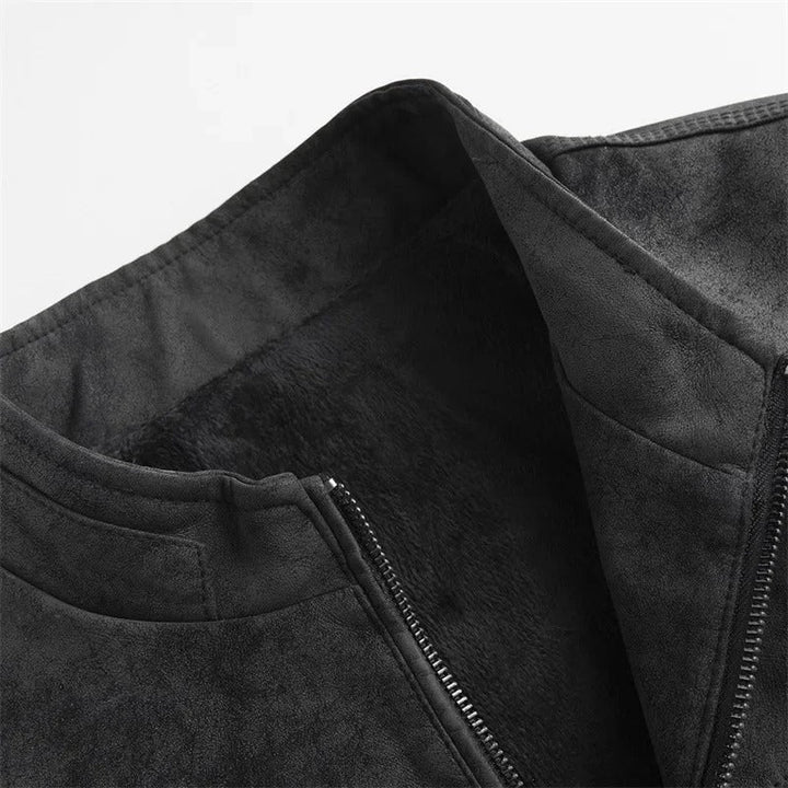 Casual men's apparel: a fleece-lined suede-like jacket, ideal outerwear for winter, featuring functional zippered pockets.