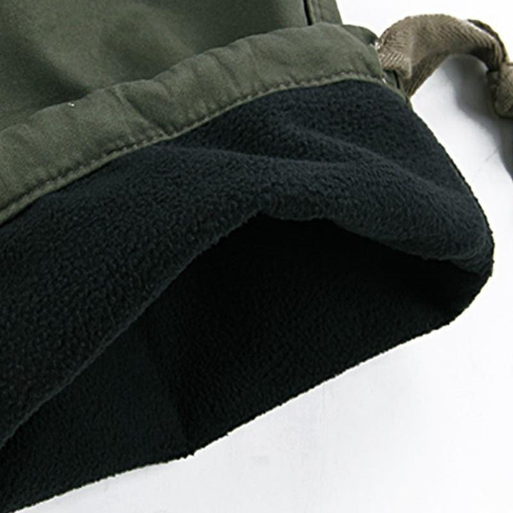 Rugged men's cotton tactical pants with warm fleece lining, designed for durability and comfort