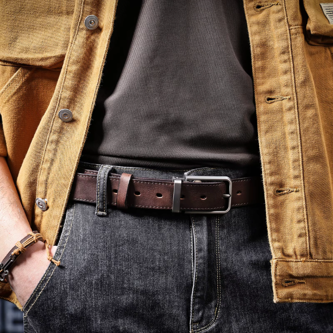 Close up of the leather texture on a men's black full-grain belt, durable material