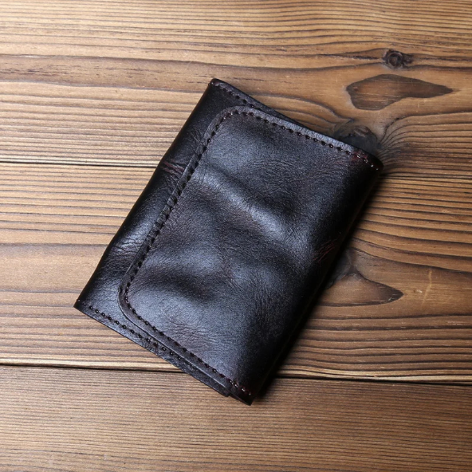 Elegant men's trifold wallet, made from authentic full-grain leather