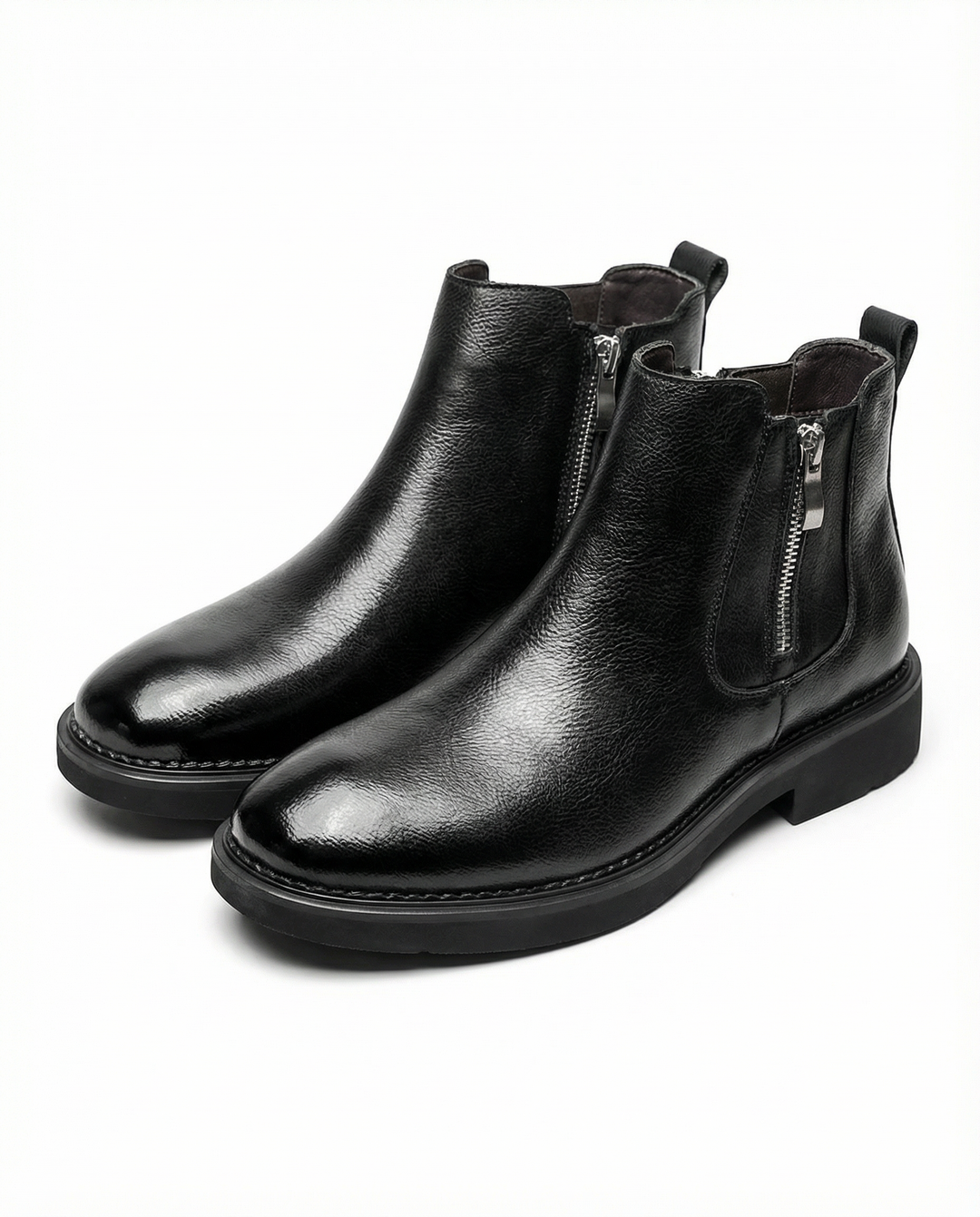 Elegant black full-grain leather ankle boots for men, featuring a sleek design and practical side zip, ideal for everyday wear