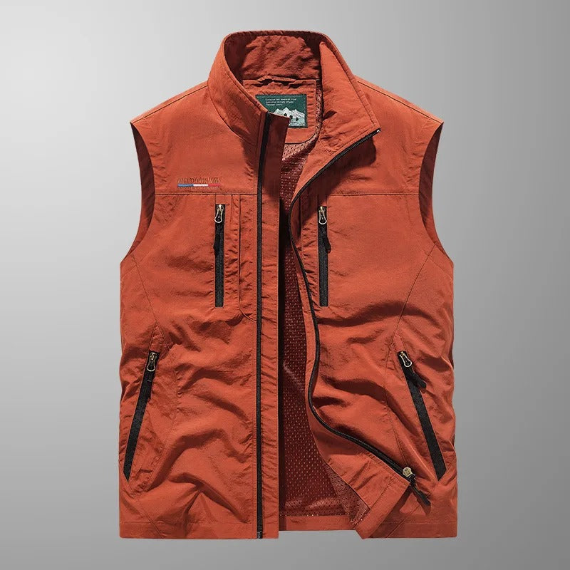Men's full zip outdoor vest for activewear. Warm, sleeveless, and versatile for hiking and casual wear.
