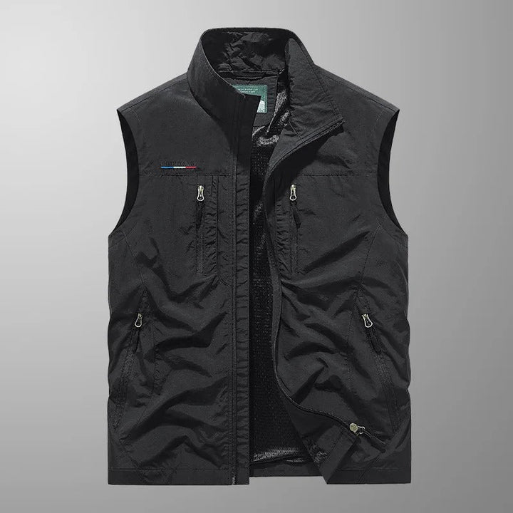Stay active & warm in this men's full zip outdoor vest. Ideal for hiking, layering, and travel comfort.