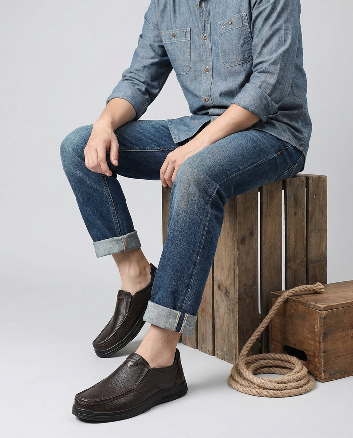 Dark brown genuine leather slip-on loafers for men, ideal for casual fashion and comfort