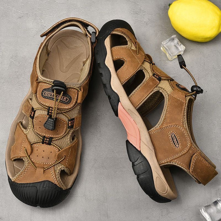 Studio shot of men's genuine leather arch support fisherman sandals, isolated on white background