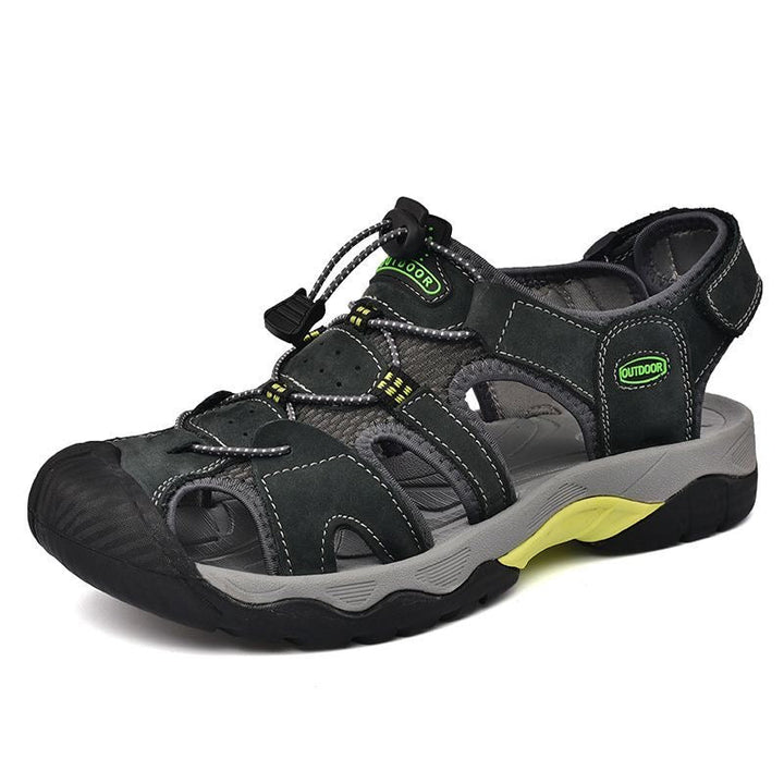 Pair of men's arch support outdoor sandals, brown genuine leather, displayed on a natural background