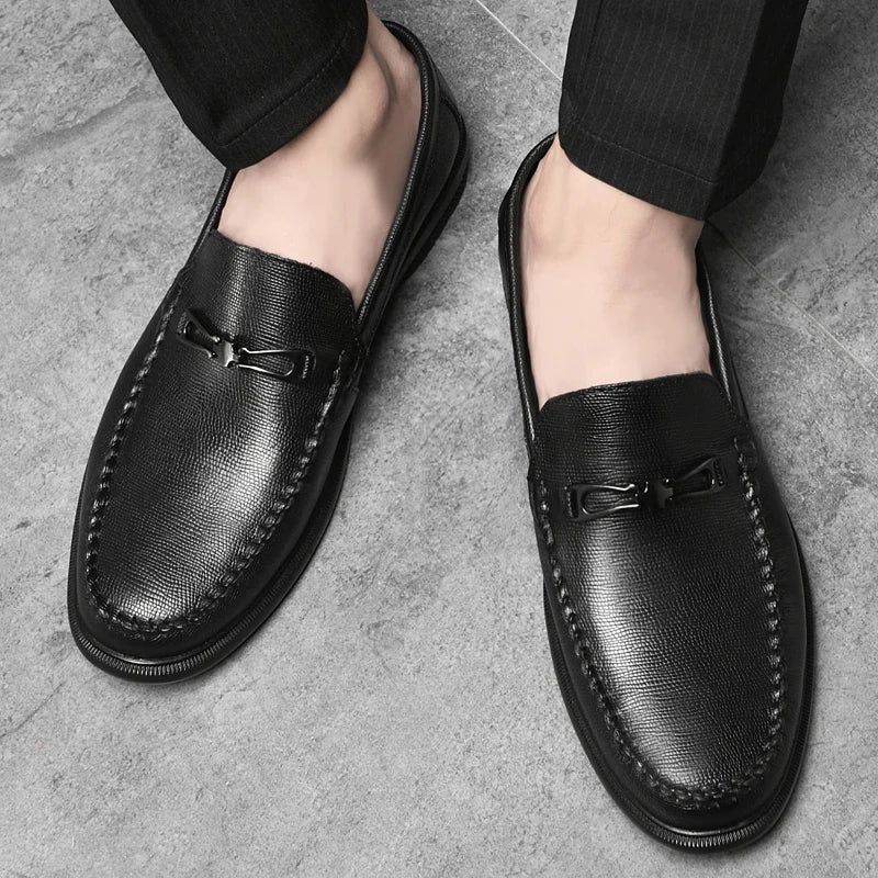 Top view of men's slip-on loafers, genuine leather, highlighting the comfortable design.