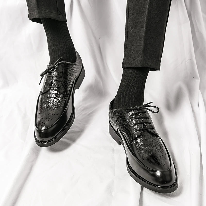 Stack of men's genuine leather Oxford shoes in various colors, highlighting range of formal footwear.