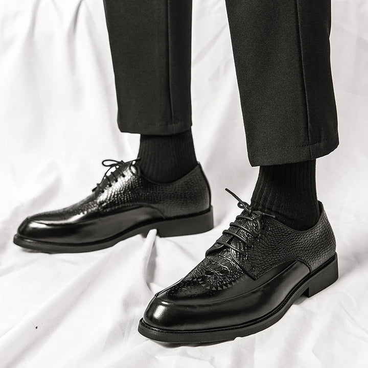 Close-up of brogue perforations on men's genuine leather Oxford shoe, classic & refined look.
