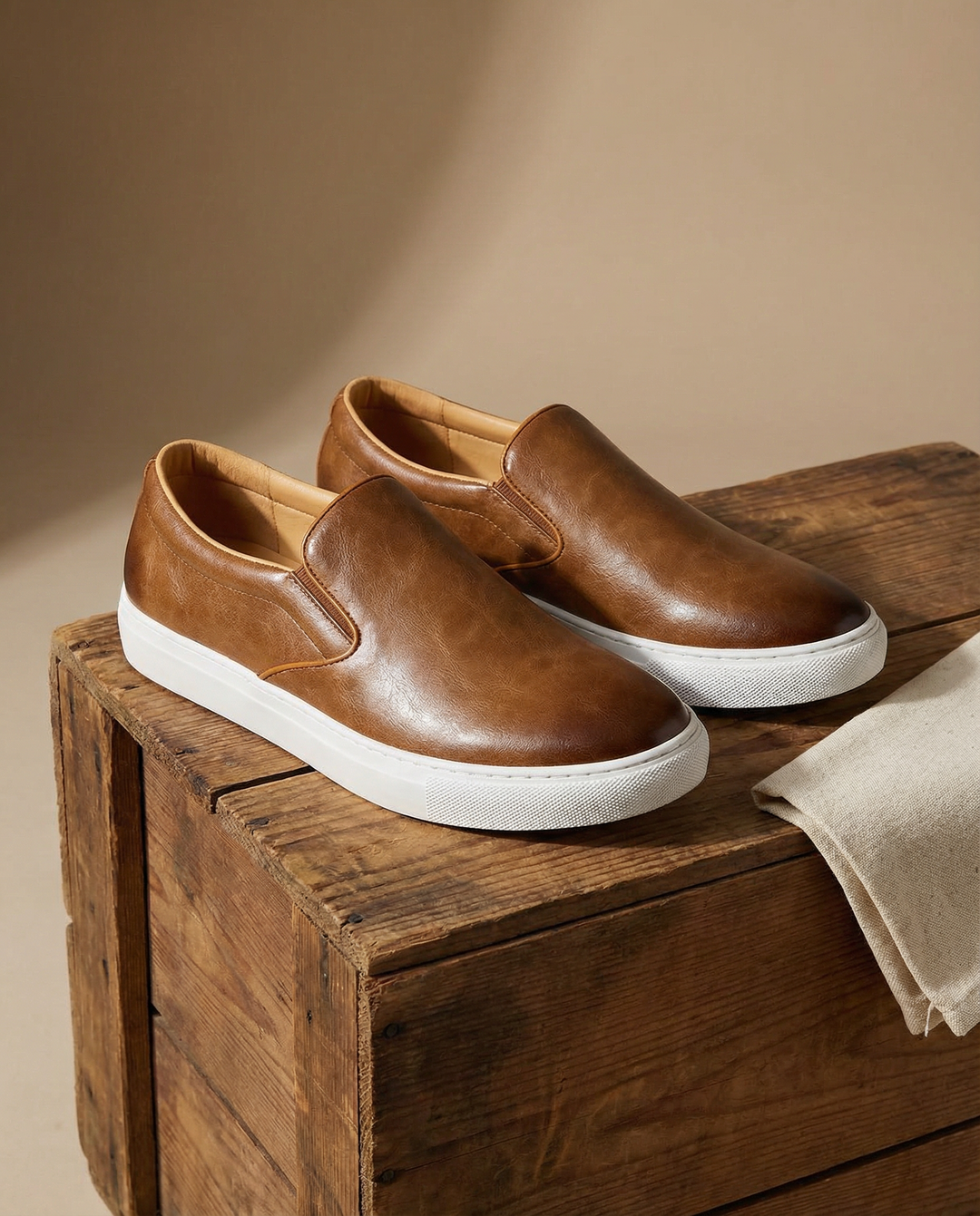 Black men's genuine leather slip-on shoes, showcasing their durable design for everyday footwear.