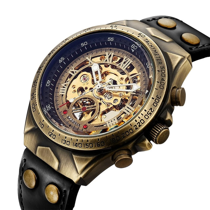Side angle of a men's gold watch with automatic movement, skeleton dial, and premium leather strap