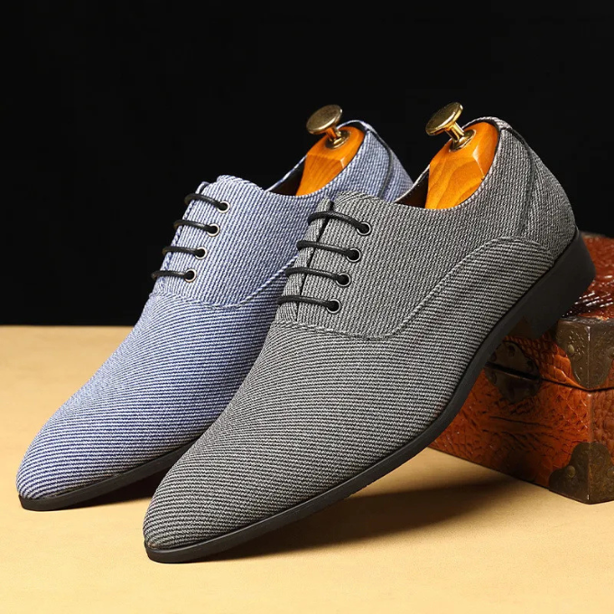Lace-up men's blue woven derby shoes, side profile, modern casual and dress footwear