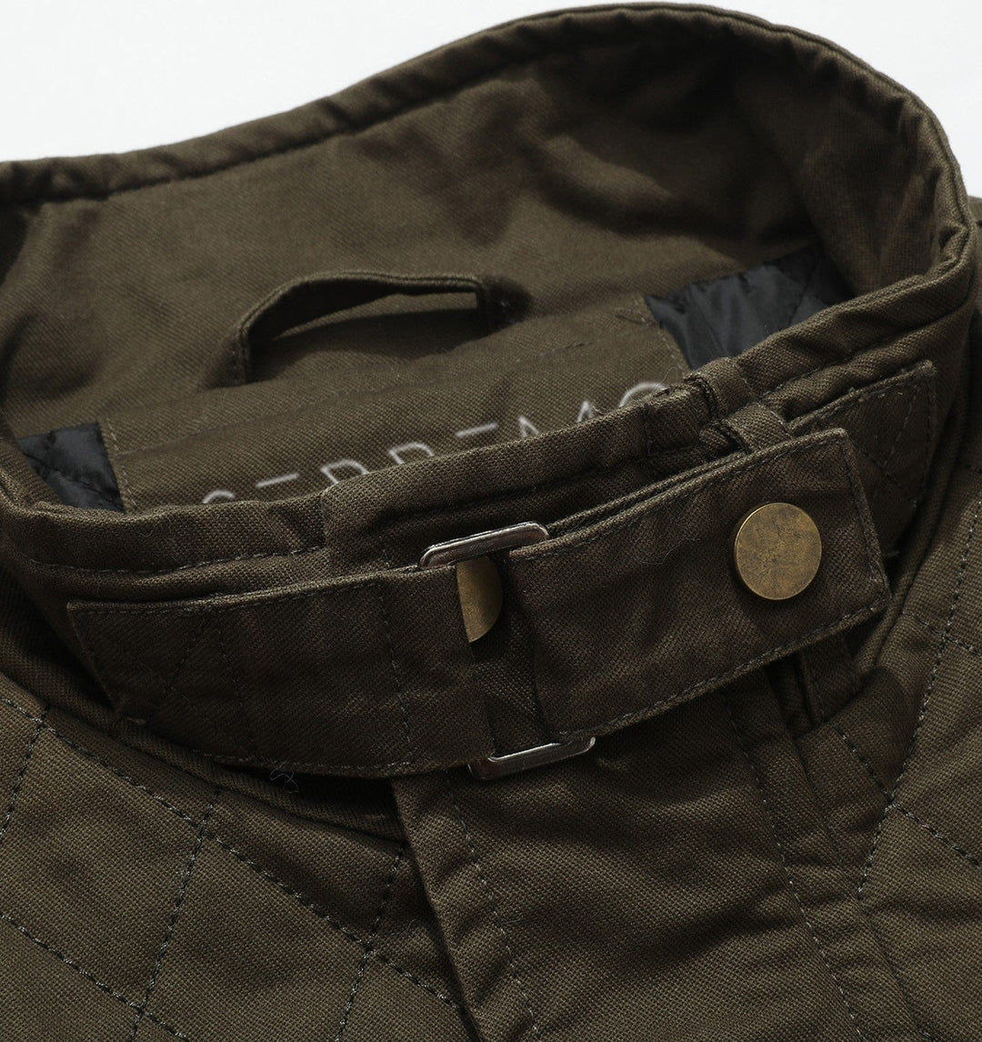 A men's field jacket with adjustable cuffs and a warm, insulating quilted lining.