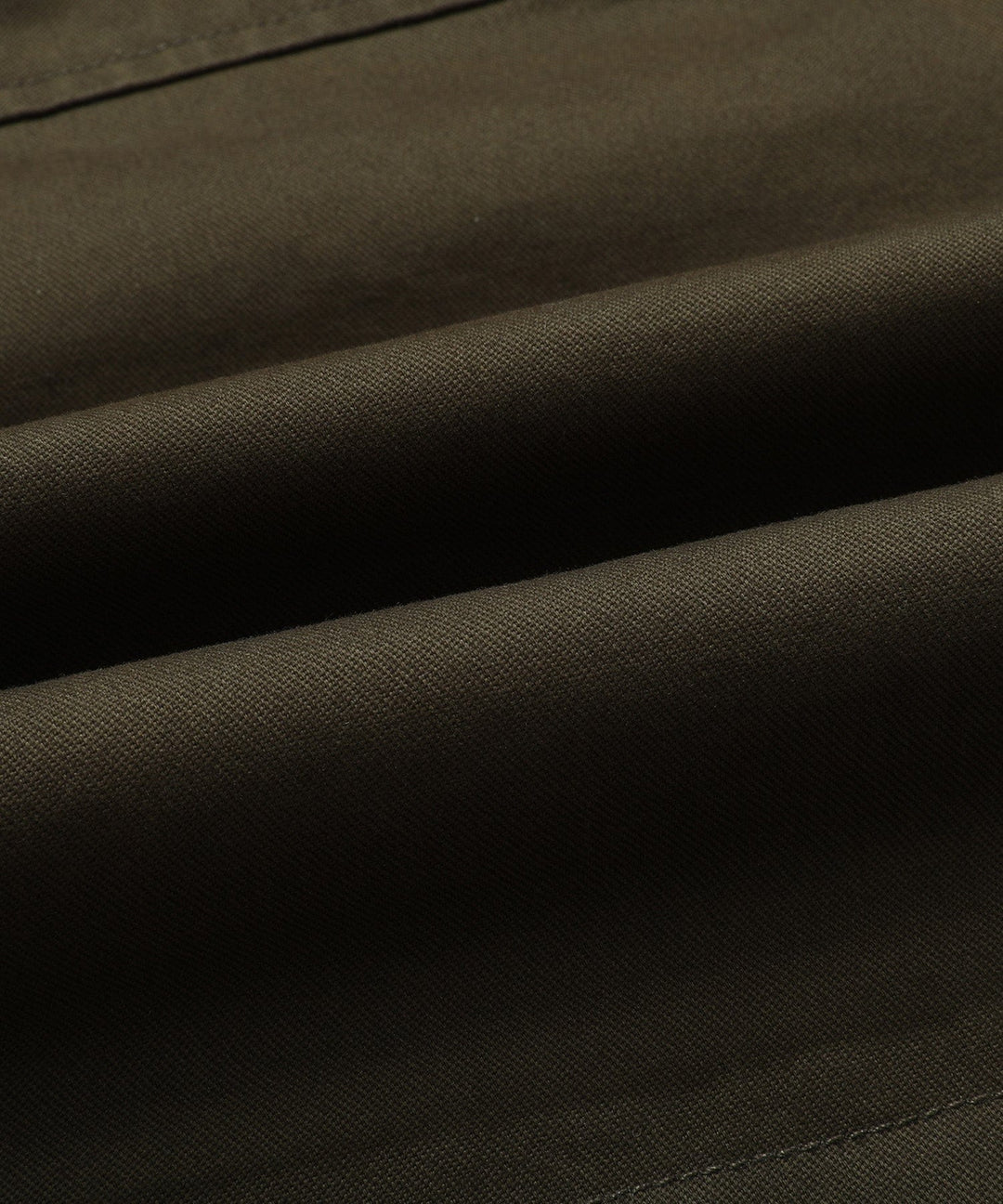 Everyday men's outerwear: a rugged field jacket with a cozy quilted lining for cooler days.