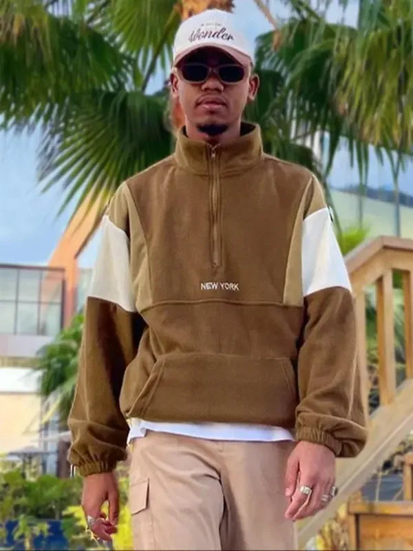 Men's half-zip mock neck pullover jacket in a stylish color block design.