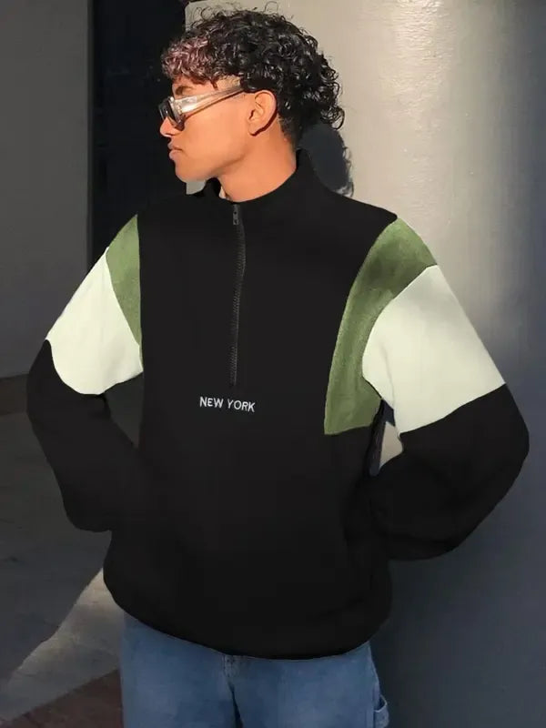 Casual men's fleece blend pullover jacket with a half-zip and mock neck.
