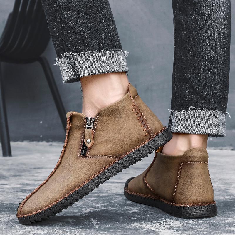 Front view of men's casual leather ankle boots, hand-stitched for unique style