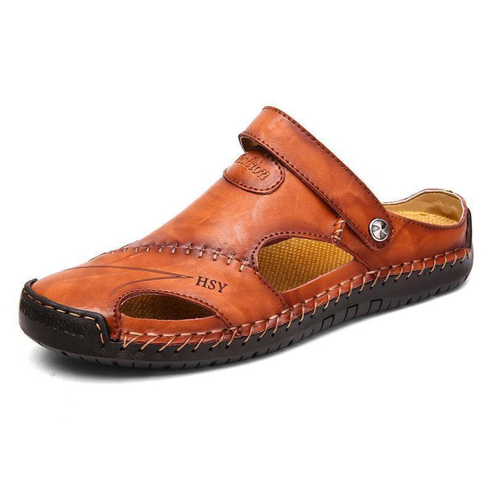 Men's hand-stitched closed-toe genuine leather outdoor sandals, side view, natural light.