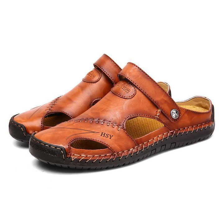 Close-up of the genuine leather texture on men's closed-toe casual outdoor sandals.