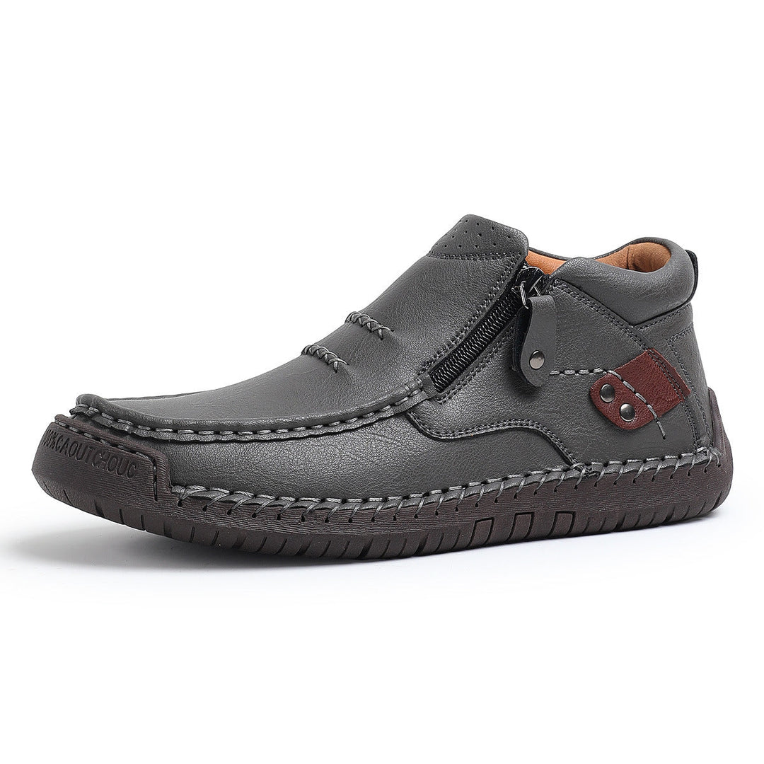 Side profile of comfortable men's high-top leather boots, showcasing their orthopedic support.