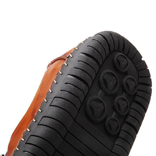 Pair of men's hand-stitched leather loafers, slip-on with zipper, comfortable & durable