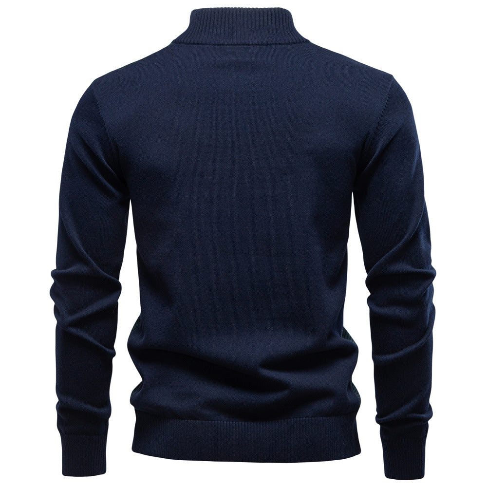 Folded men's half-zip sweater, showing texture of cotton blend fabric, comfortable pullover
