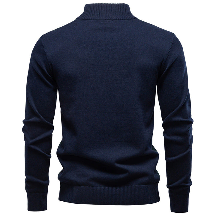 Folded men's half-zip sweater, showing texture of cotton blend fabric, comfortable pullover