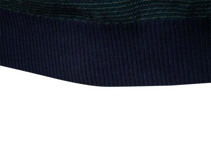 Close-up of knitted pattern on men's half-zip sweater, soft cotton blend texture