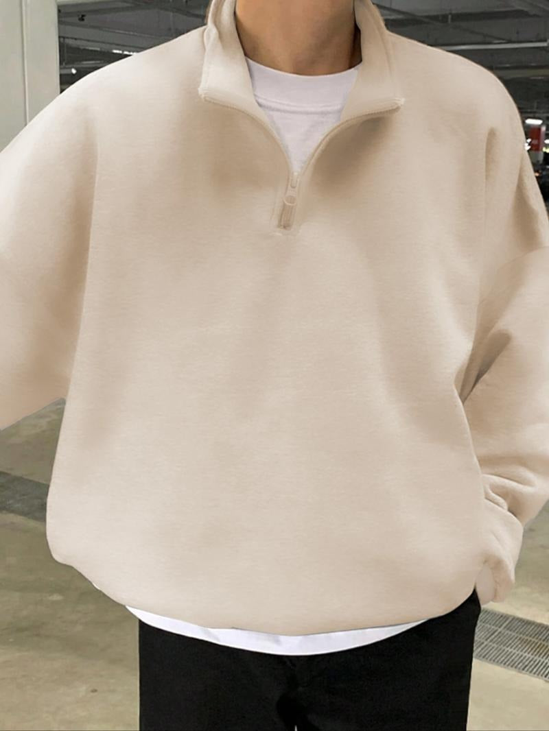 Men's heather gray half-zip fleece sweatshirt with a modern fit, ideal for casual layering