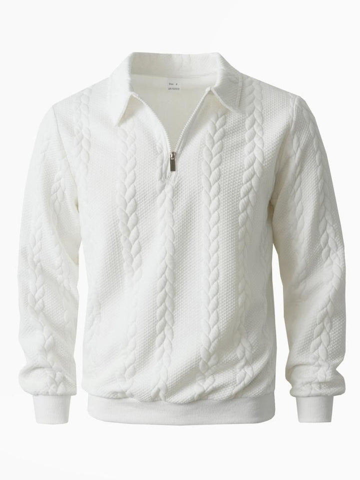 Close-up of a men's polyester knit half-zip sweater in classic navy, long sleeve style.